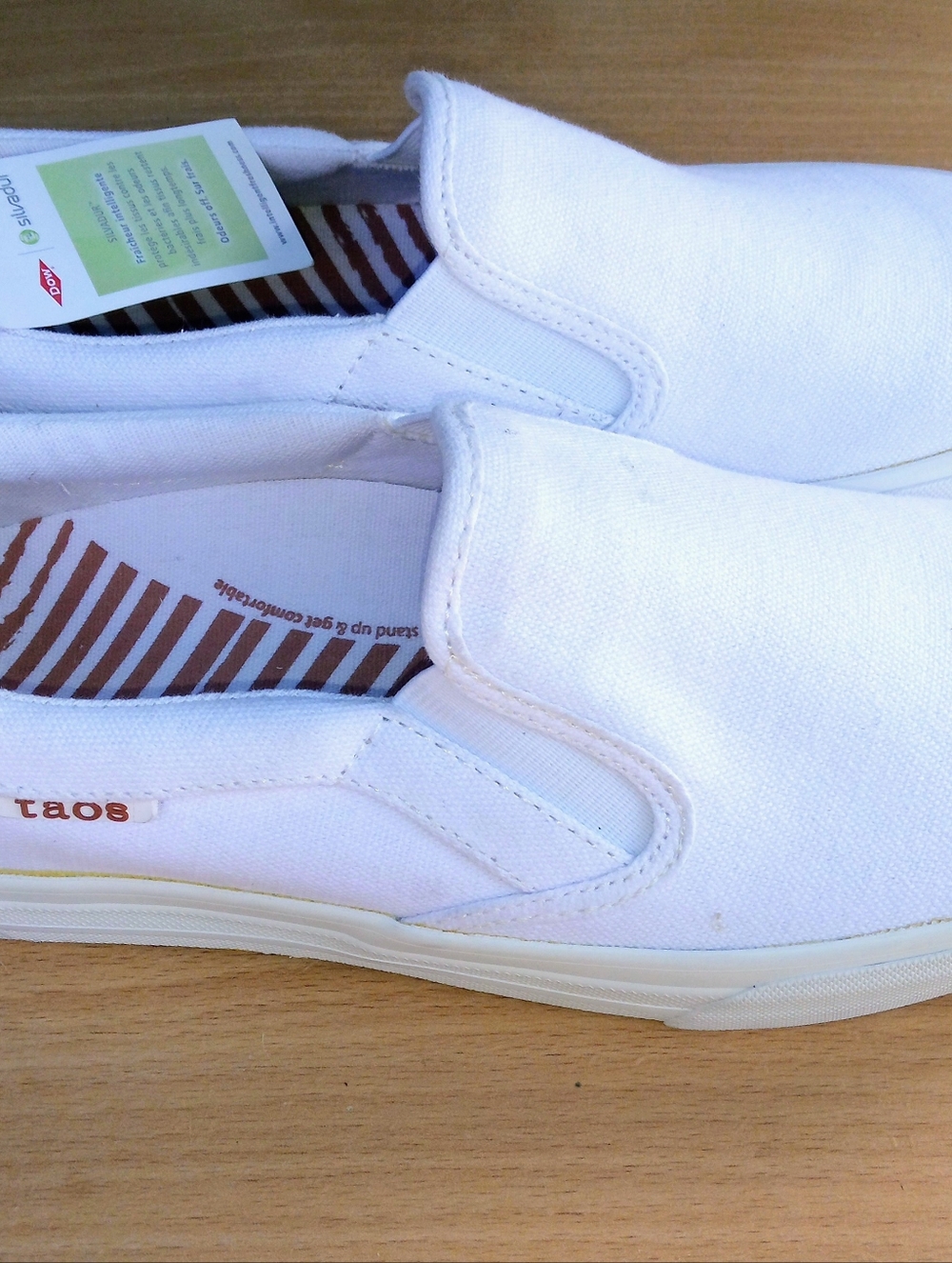Taos Footwear White Slip-On Canvas Sneakers for Women
